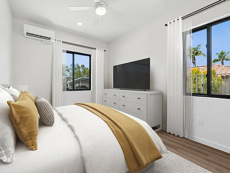 Freestanding Home bedroom with hard-surface flooring