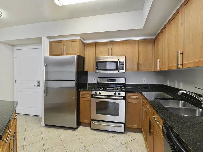 Modern Kitchen with Dishwasher, Disposal, Pantries, and Microwaves