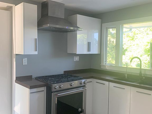 Stainless steel appliances with a gas range and oven