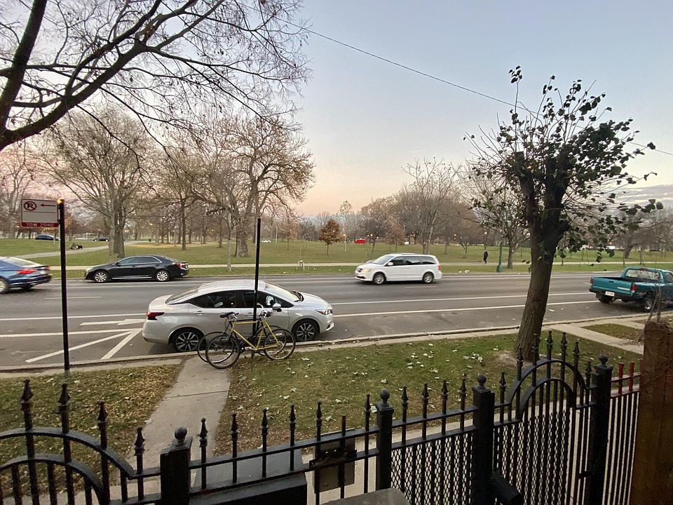 View of the park from front stairs with plenty of Street parking.