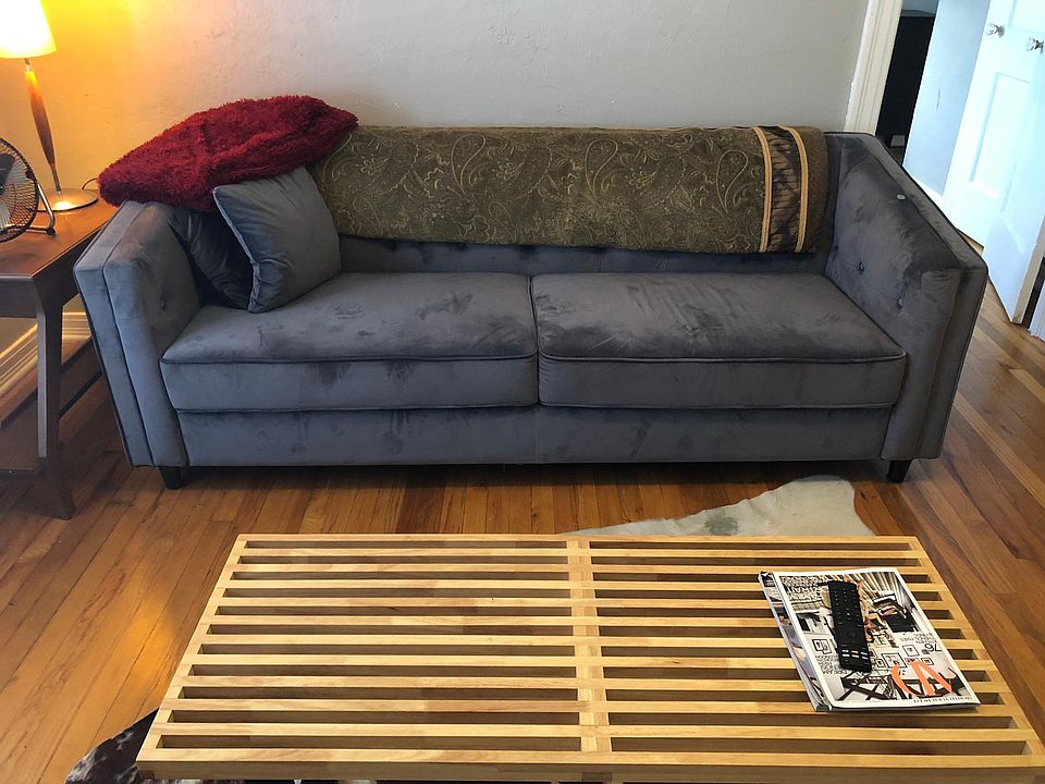 Comfortable couch & coffee table.