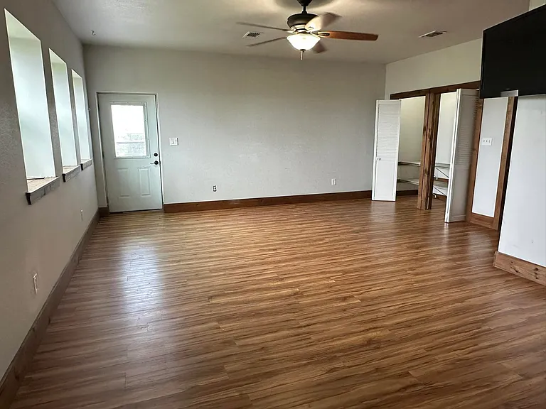 Primary bedroom exit to deck