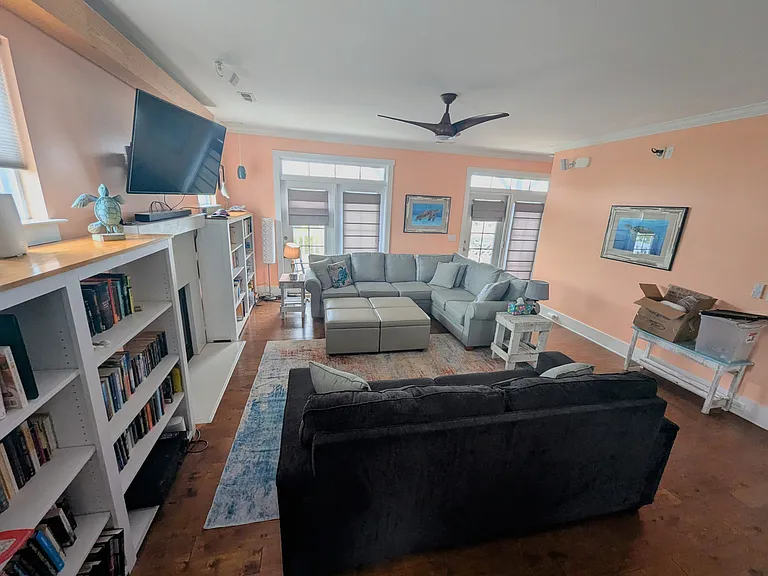 Open floor plan view of living room from kitchen