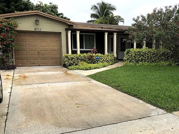 Showing garage & entrance