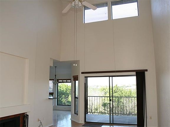 Abundant natural light fills the dramatic two story living a