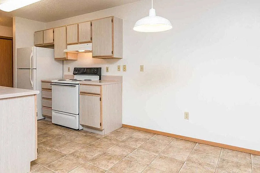 EAST WOODS APARTMENTS — Photo 3