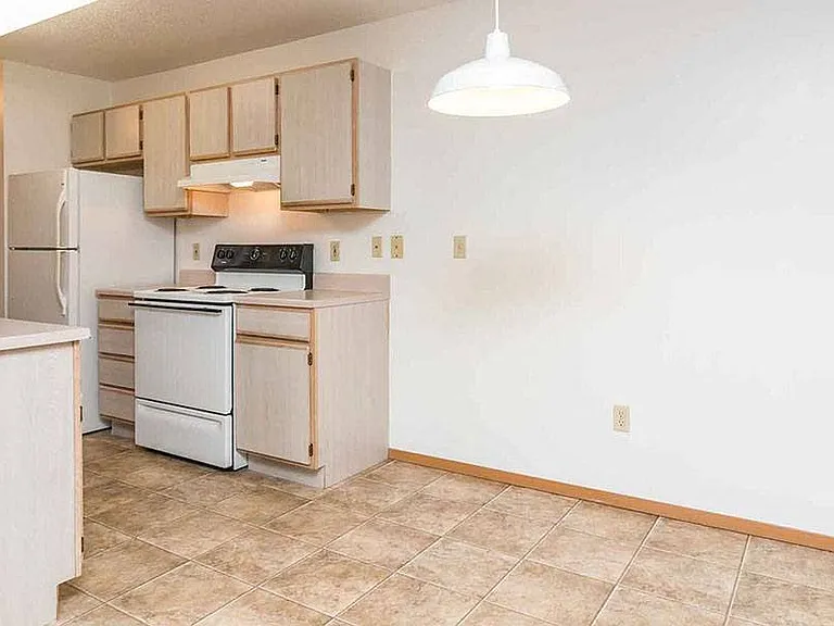 EAST WOODS APARTMENTS — Photo 3