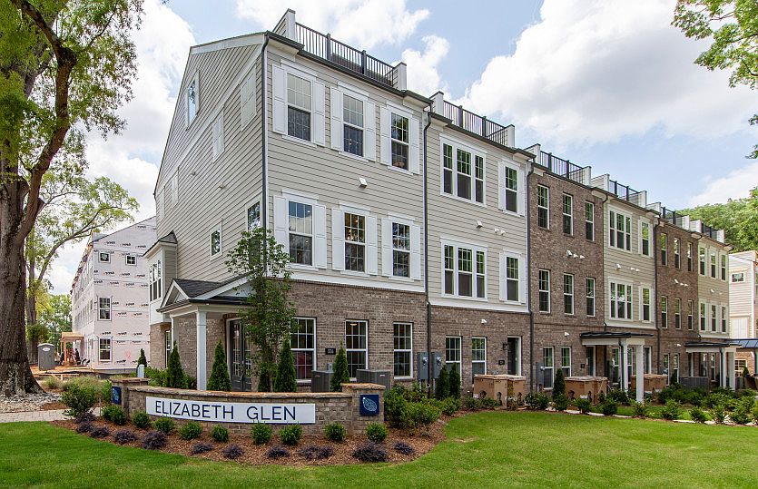 Broxton Exterior 74 features James Hardie TM siding, brick, covered front door, terrace and 2 car r