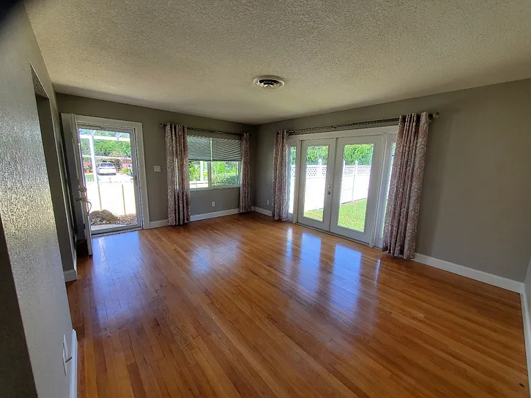 Hardwood floors throughout. Large deck has just been added off the french doors