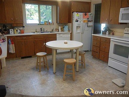 Kitchen area with new vinyl flooring
