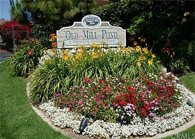 Old Mill Pond front monument by the kiosk and gate.