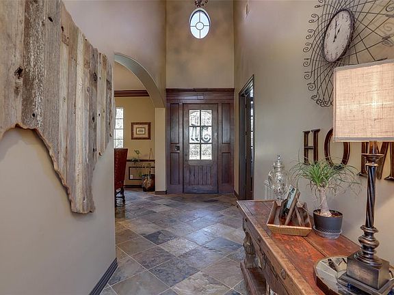 Soaring ceiling in foyer welcomes you into this spacious home