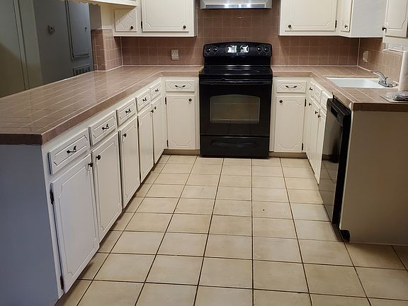 Recently painted. Ample counter space and cabinets wirh new dishwasher.