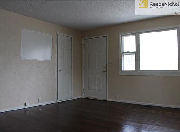 Living Room with refinished wood floors and interior paint