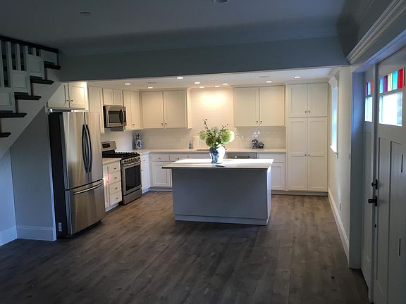 View of new kitchen with stainless steel appliances
