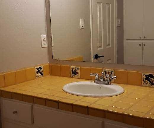 Bathroom with new lighting and exhaust fan