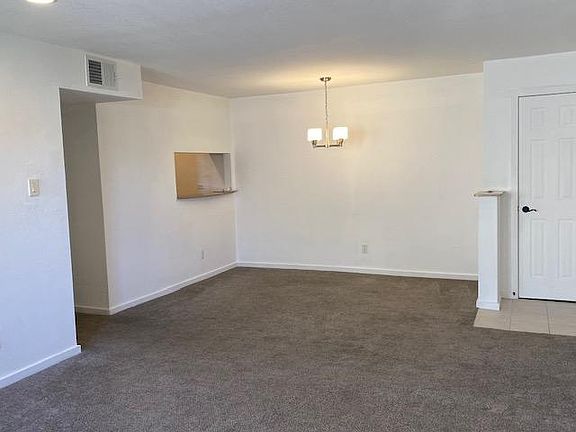 living area with kitchen cutout