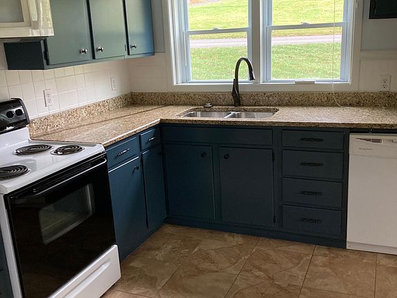Kitchen with granite countertops.