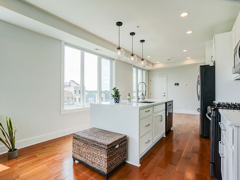 Sun Drenched Kitchen, Living Room and Dining Area