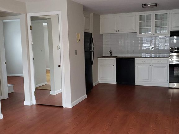 This photo shows the Kitchen, Closet with mirror and 2nd Bedroom