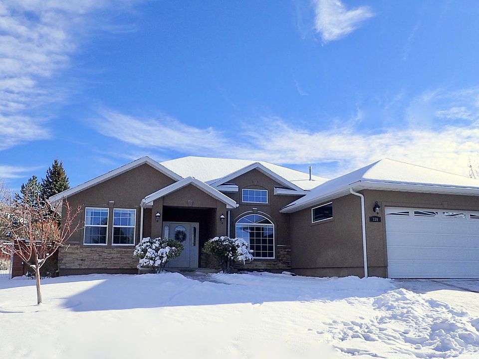 Front of the house, gate is on the left to access the backyard.