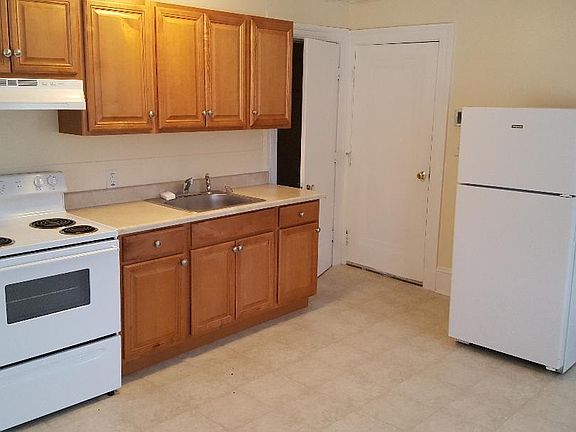 Large kitchen. Storage door to the left entrance door to the right.