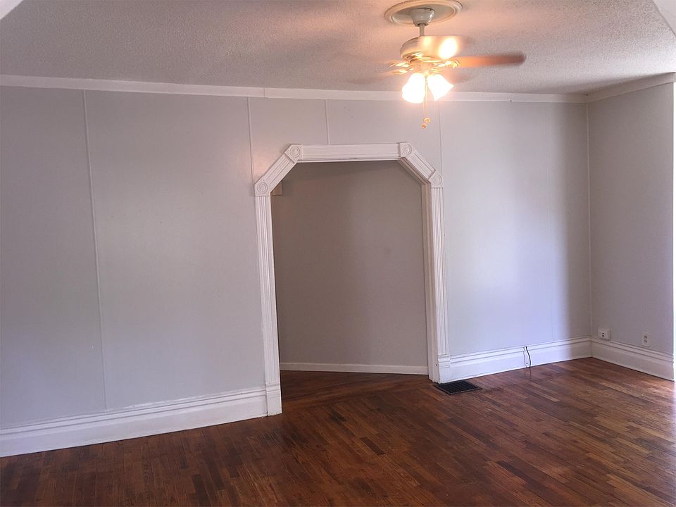 Double size living room with ceiling fan