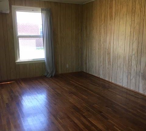 Enter the Living Room. Warm real Hardwood floors.