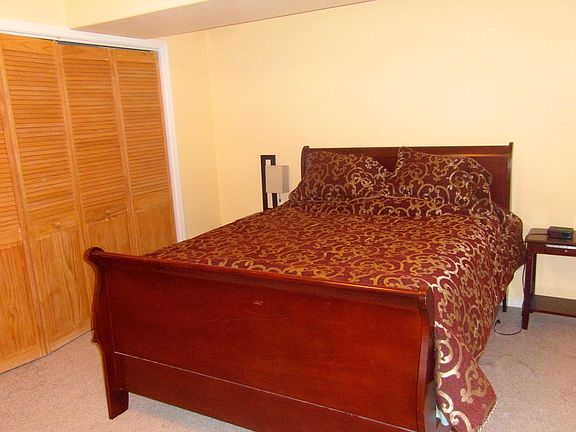 Bedroom with view of closet