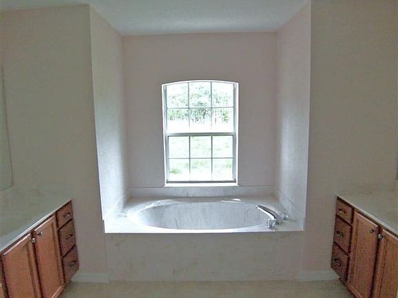 Soaking tub His & Hers Vanities