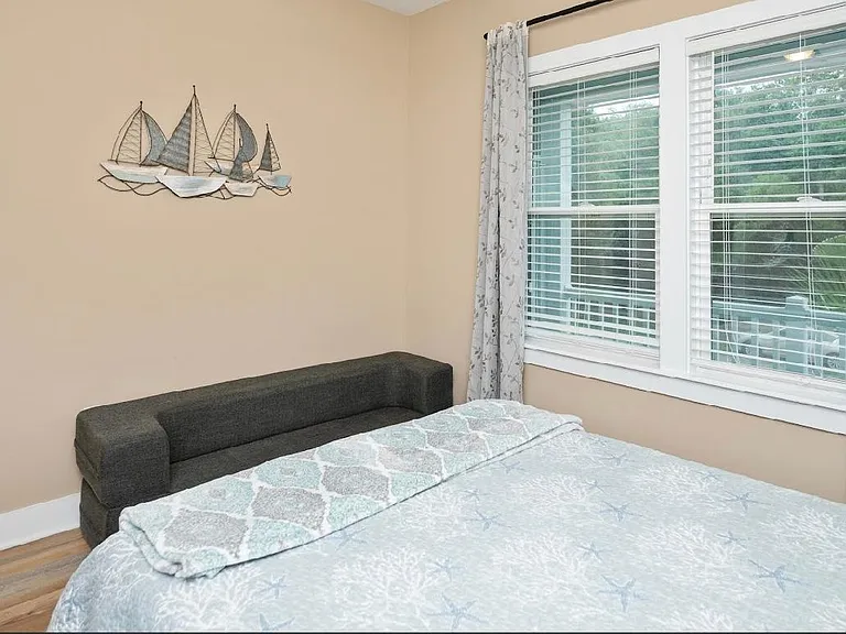 2nd bedroom has a sitting couch