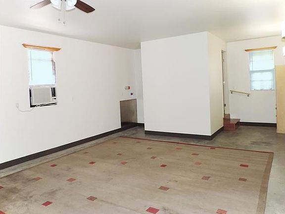 Downstairs Bedroom and Bath. Stack Washer and Dryer is inclu