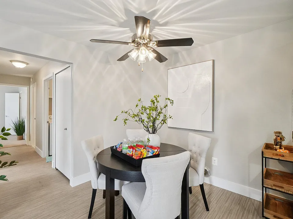 Gather for meals in comfortable dining areas with ample space for family and friends, professionally operated by Highlands Vista Group.