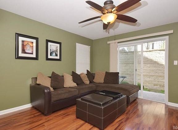 13'x13' Living room with slider to private patio and green space