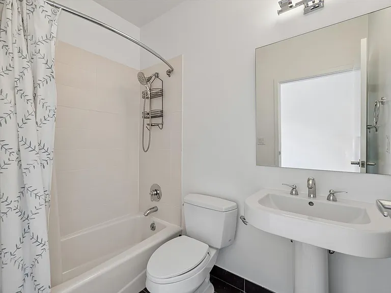 Upper level secondary bedroom ensuite bathroom