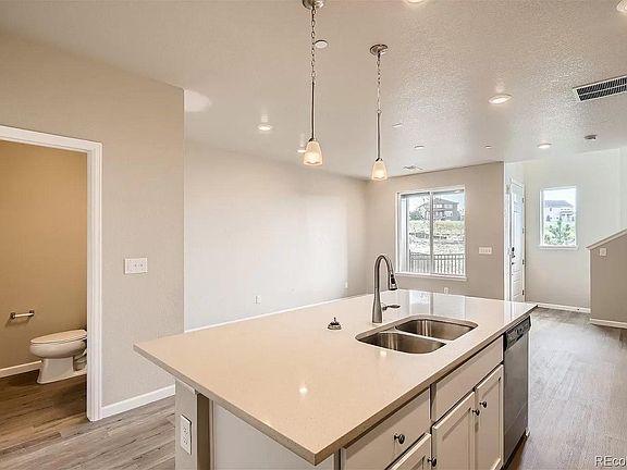 First level has an open floor plan and half bath