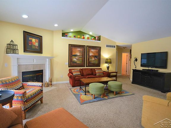 Vaulted ceiling and decorators ledge highlight this space