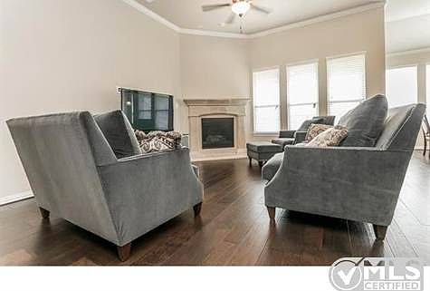 Living Room has hardwood flooring.