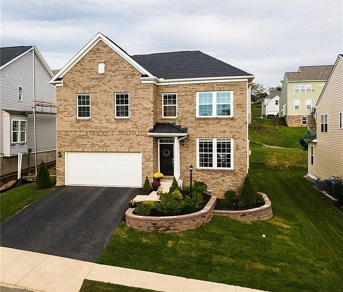 Brick front with professional landscaping, Easy maintenance.