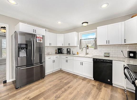 5th image of 807 SW Hill Top Ct