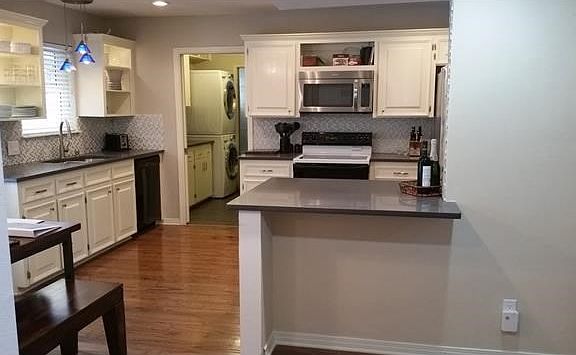 Brand new remodeled kitchen - added bar seating area, new silestone countertops and cabinets to come!