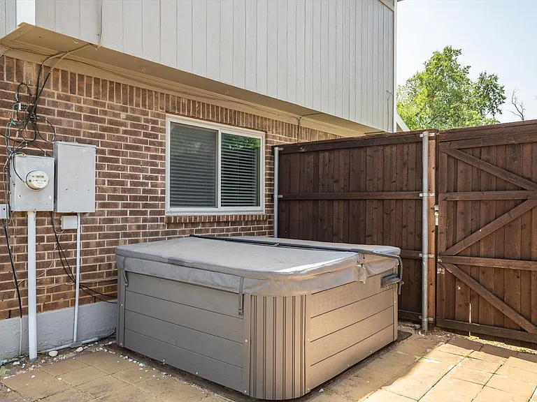 The covered hot tub is for your enjoyment!