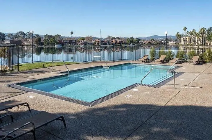 Community pool with beach access
