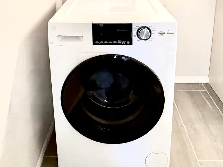 Two-in-one washer/dryer in the unit