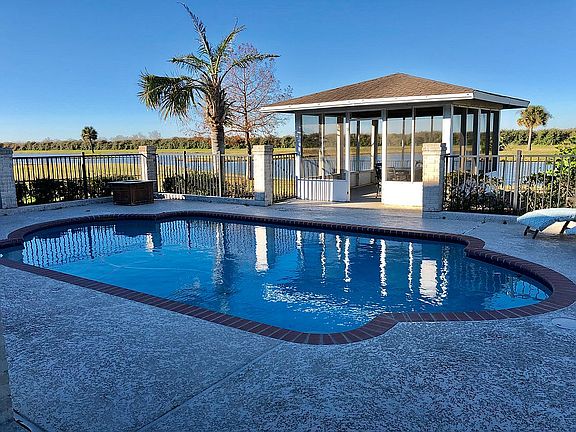 View of Pool and Lake