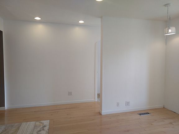 View of the front hallway from the living room.