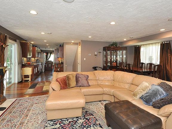 Great room on main level is just one area for hosting the next gathering with friends and family.