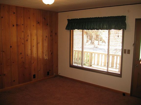 Living room, knotty pine wall