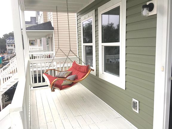 Front porch with relaxing swing