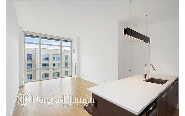 Sold by Douglas Elliman | media 13